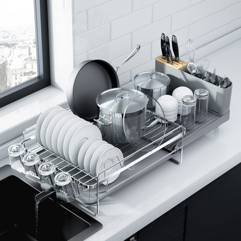 Kitsure extendable dish drying rack extended on counter, saving space and organizing dishes.