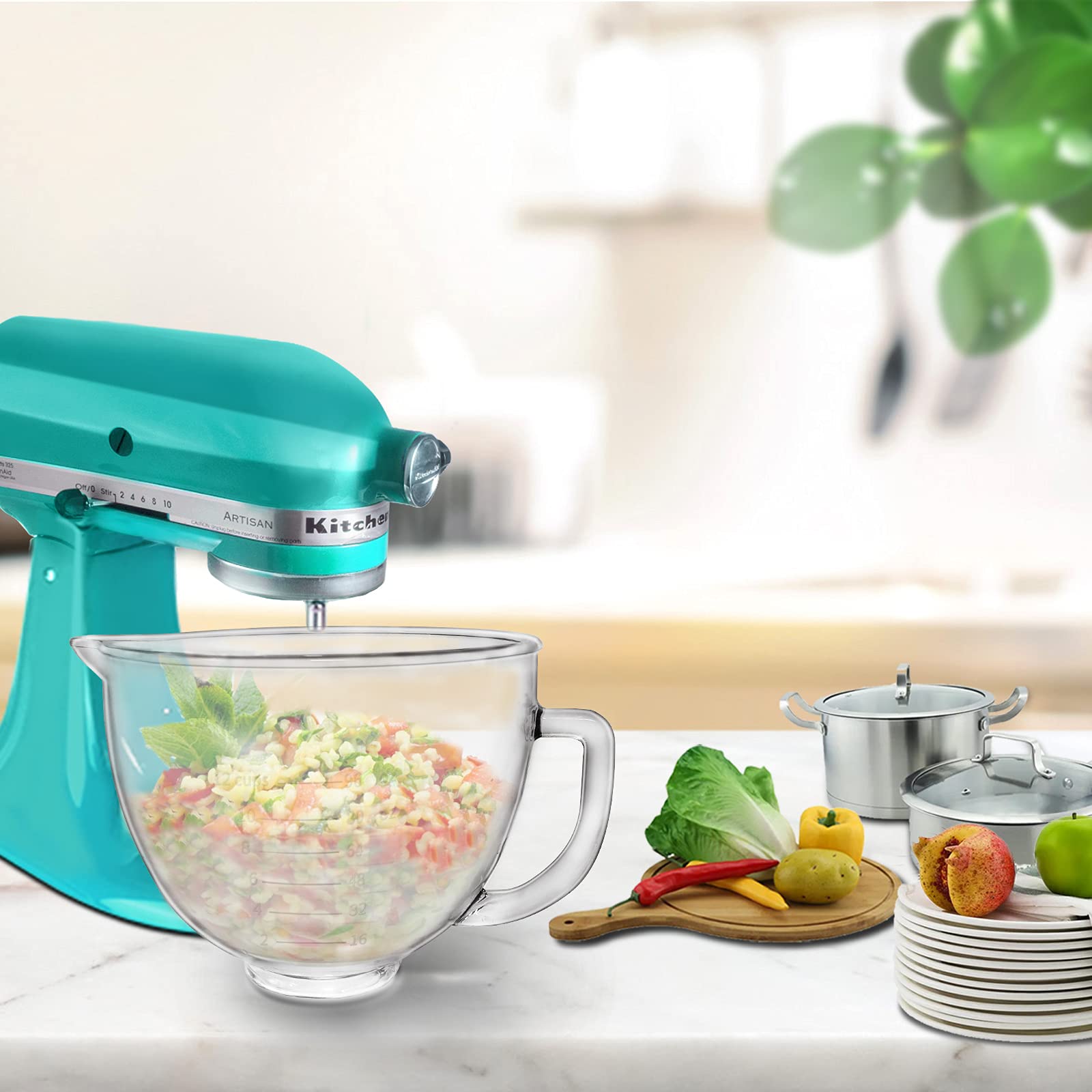 Kitwanda mixer bowl with handle for easy transfer and stable grip during use.