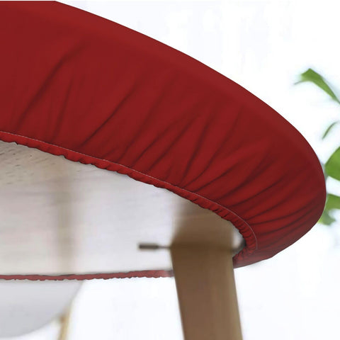 KiuLoam round tablecloth on table demonstrates secure-fit design for busy meals.