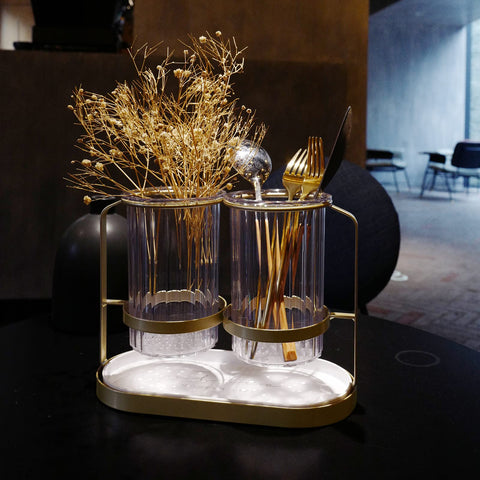 Kivsty table-top organizer with two cups for dining use.