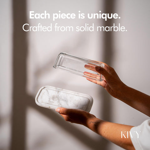 KIVY butter dish on a kitchen countertop showcases elegant white marble finish.