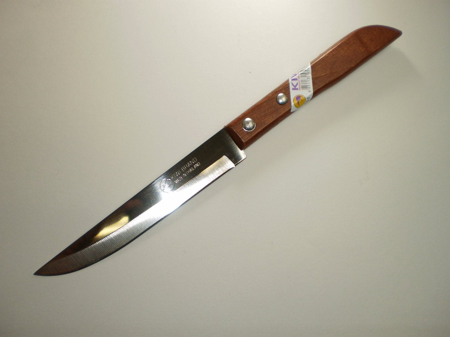 Kiwi 3-piece stainless steel knives with wood handles for precise kitchen prep.