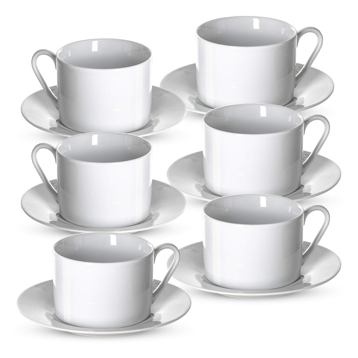 Klikel tea cups and saucers on table for elegant dining.