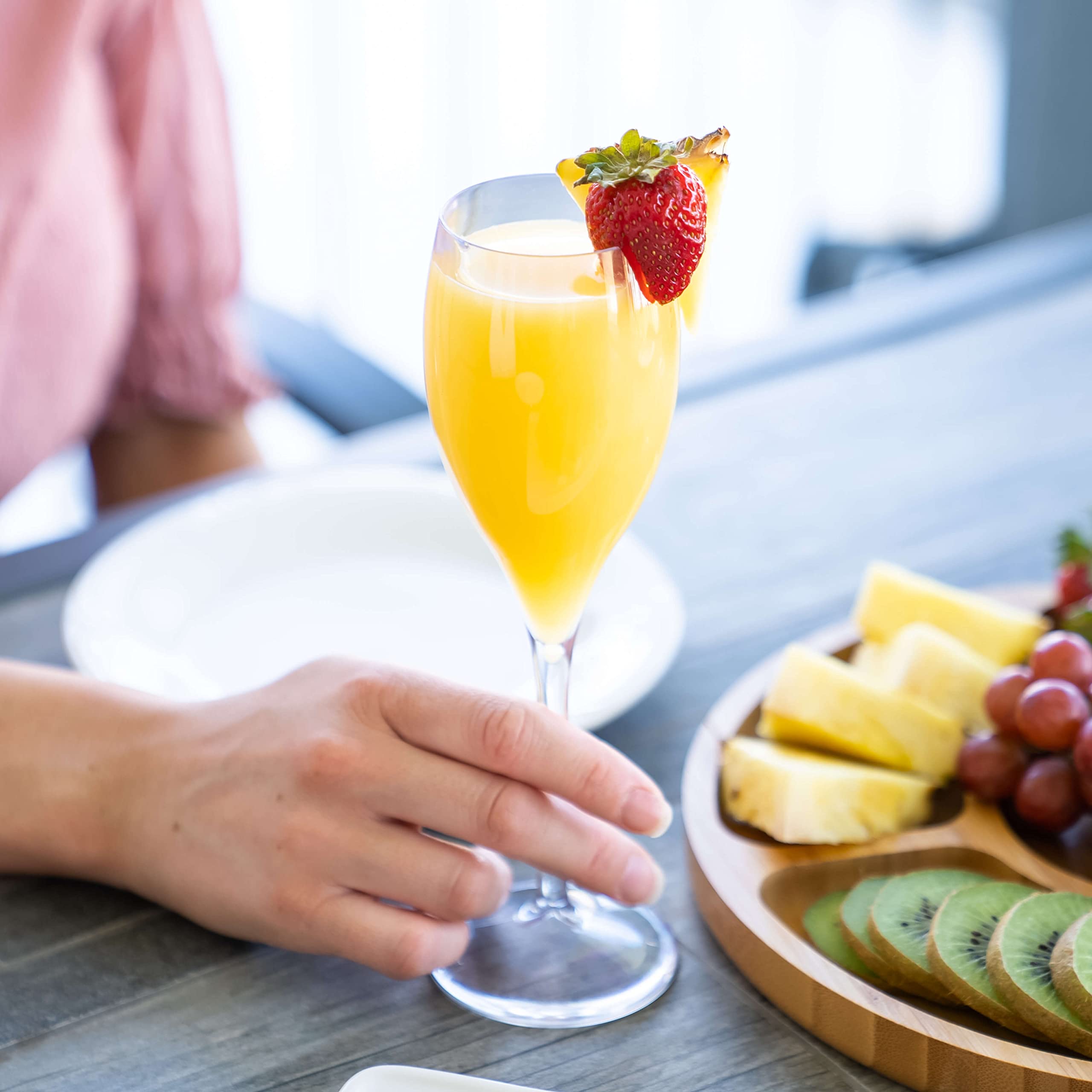 KLOVEO mimosa glasses offer bright clarity for indoor or poolside sips