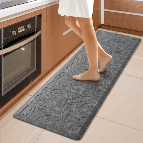KMAT kitchen mat cushions feet for long cooking sessions.