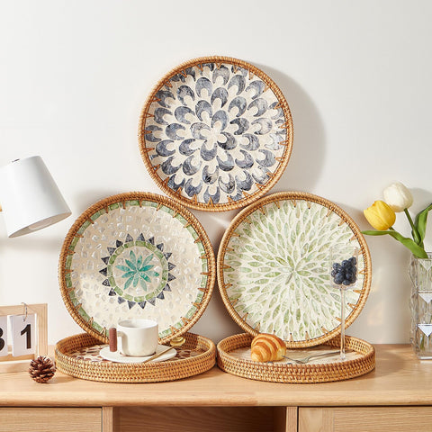 Kmelep round tray for storage and display in living spaces.