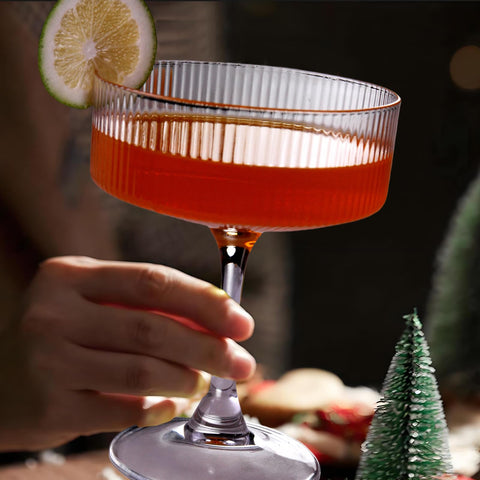 KMIGRUAN ribbed coupe glasses close-up texture shows premium design for entertaining.