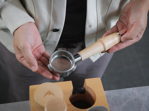 KNODOS 54mm naked portafilter highlights grind and tamp accuracy for Breville models.