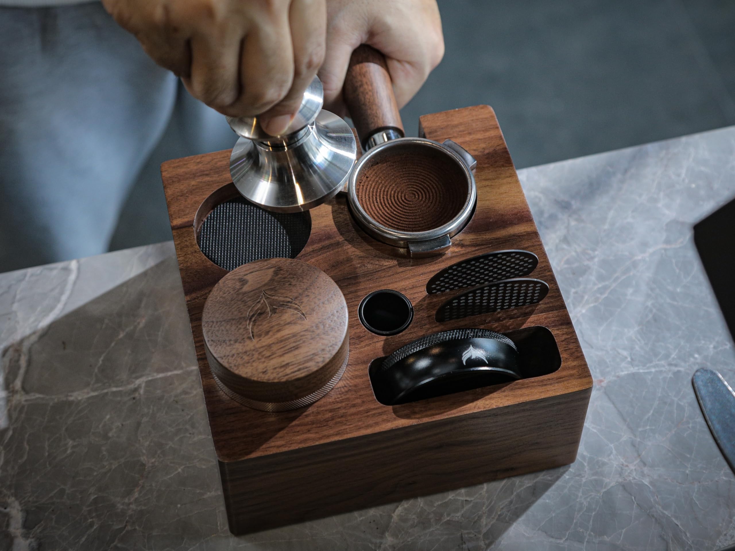 KNODOS Walnut station keeps the portafilter within reach for efficient shot pulls.