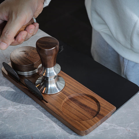 KNODOS walnut wood and leather design adds elegance to your espresso area.