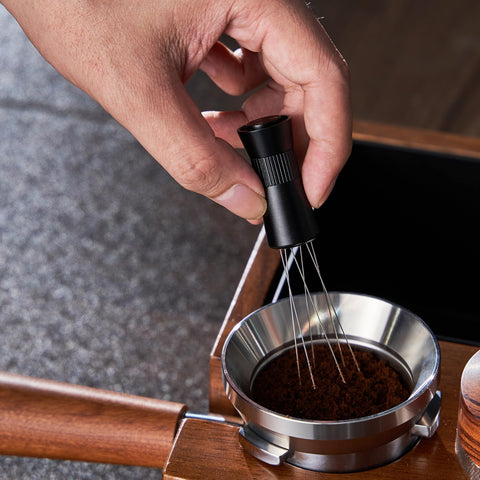 Knodos espresso stirrer shows durable anodized aluminum and stainless steel.