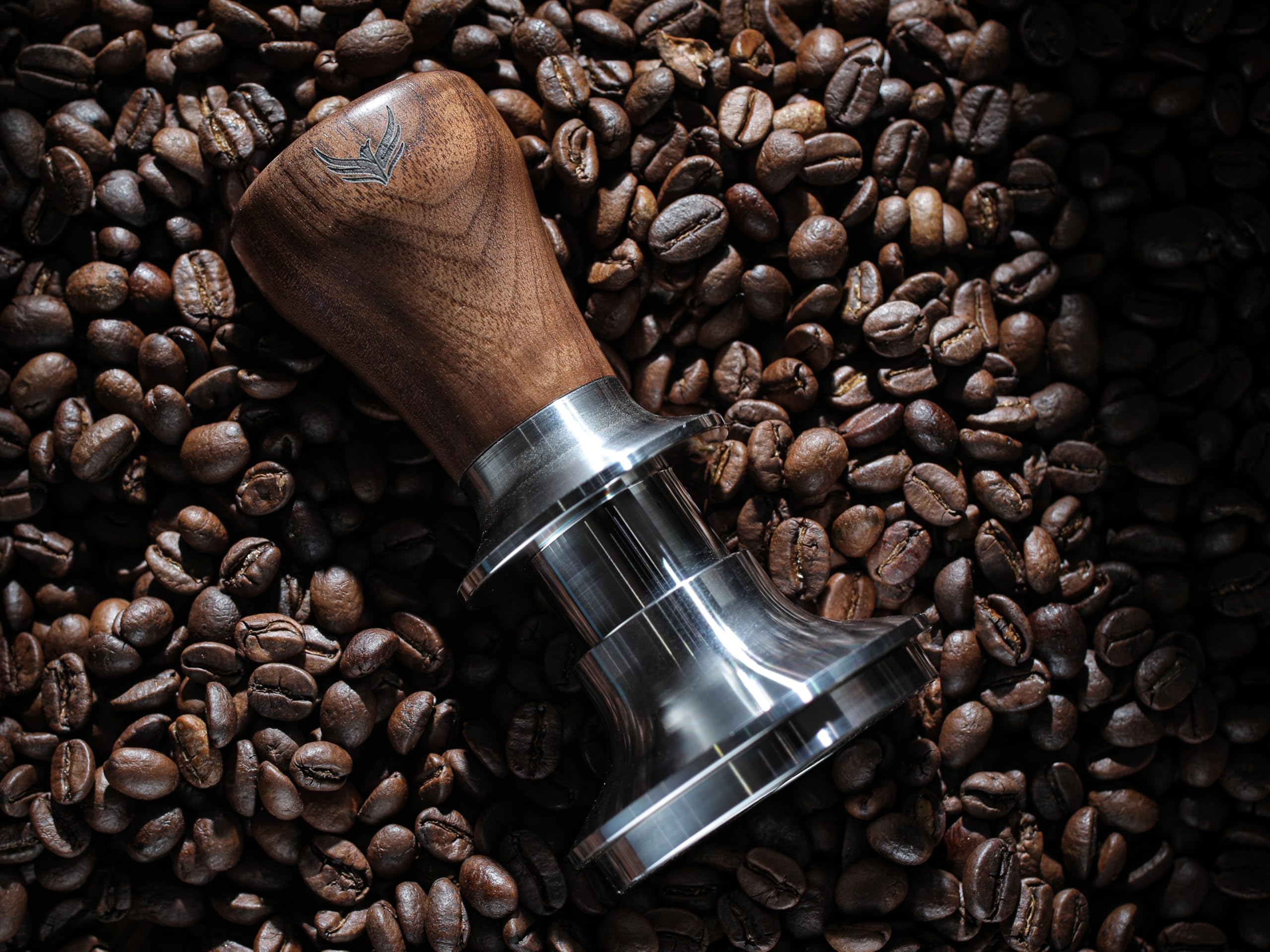 KNODOS 54mm tamper with auto-leveling mechanism for consistently even tamp.