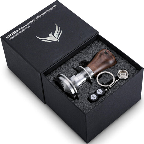 KNODOS espresso tamper with walnut handle and ripple base for even extraction.