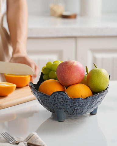 KOKUNKA blue nuts and candy bowl complements entertaining spaces.