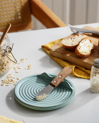 KOKUNKA blue spoon rest enhances kitchen decor with a subtle swirl motif
