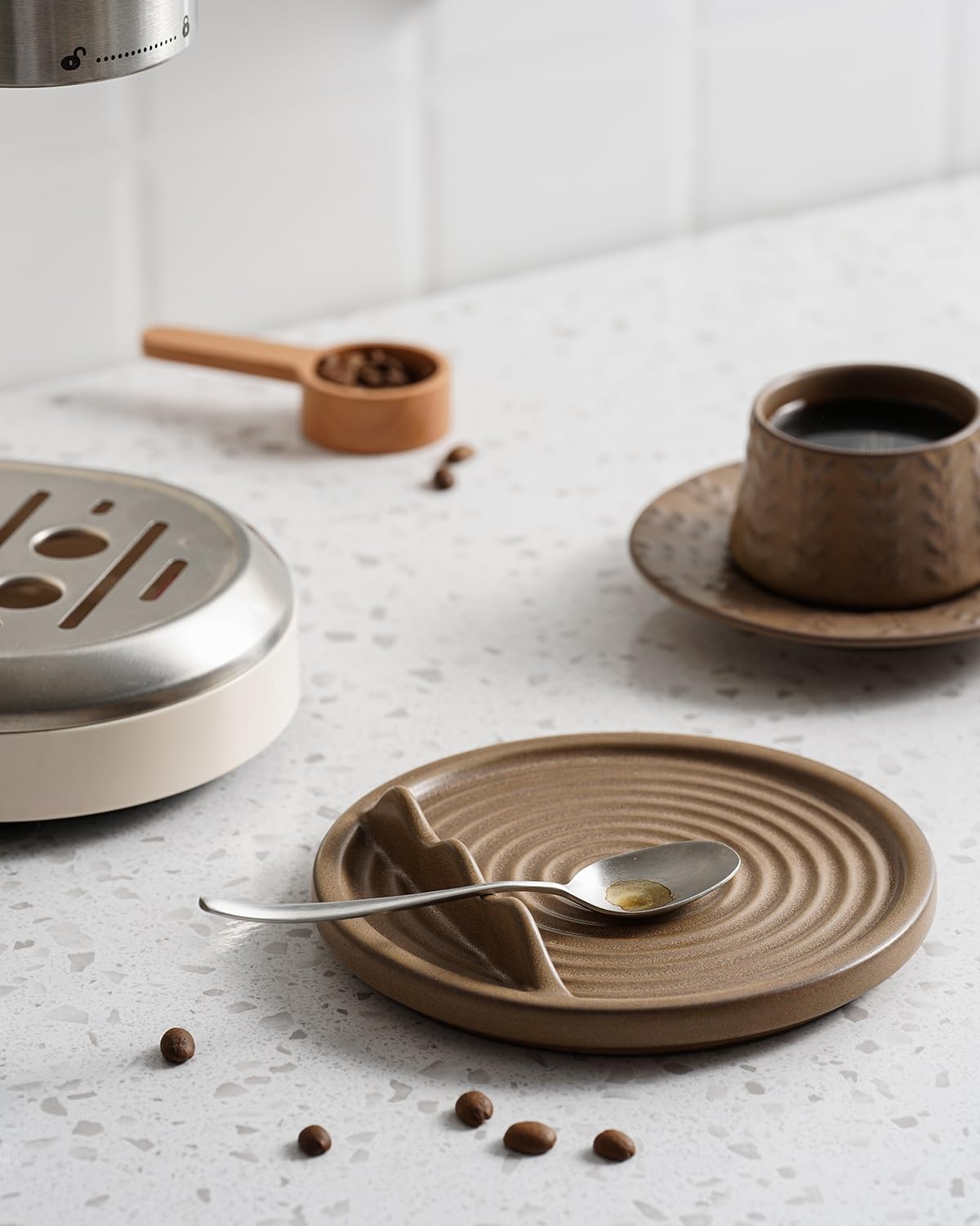 KOKUNKA brown spoon rest makes a thoughtful housewarming gift.
