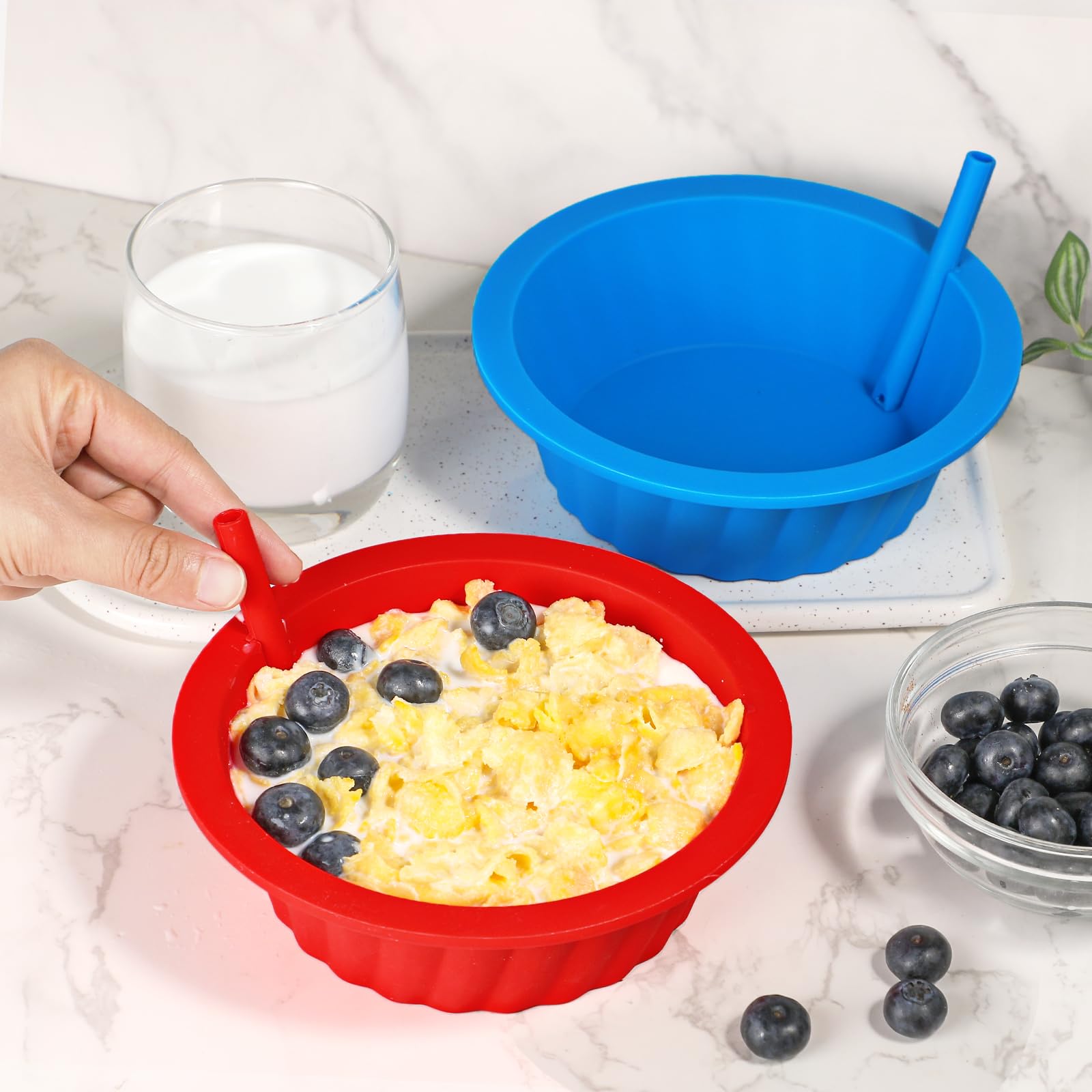 KOLUTI bowls with detachable straws for easy sipping.