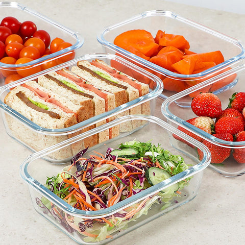 KOMUEE 30 oz meal prep containers stacked for space-saving organization.