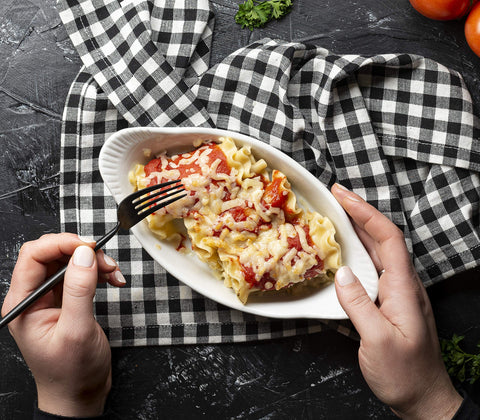 KooK dishes stacked together save space and keep servings ready.