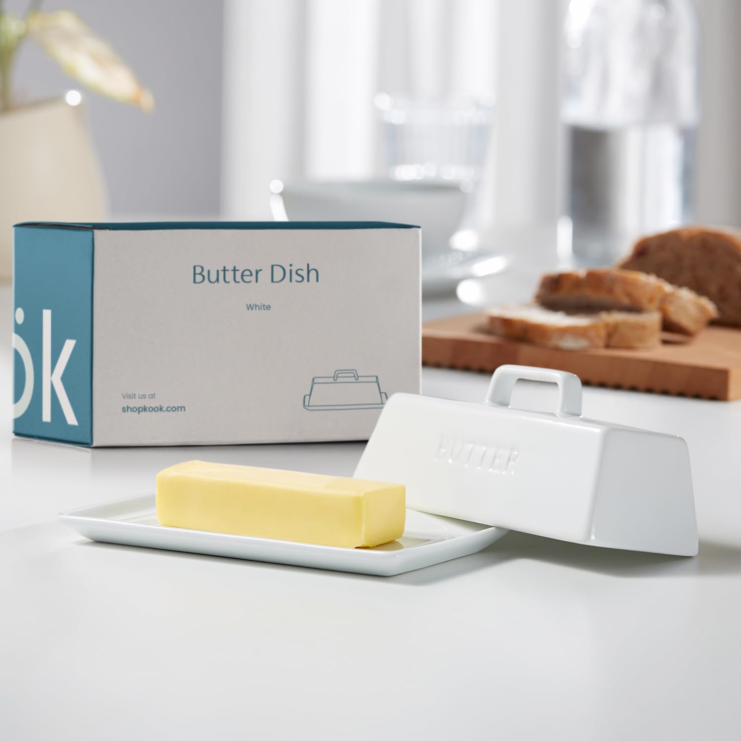 Kook butter dish lid handle shown for easy lifting.
