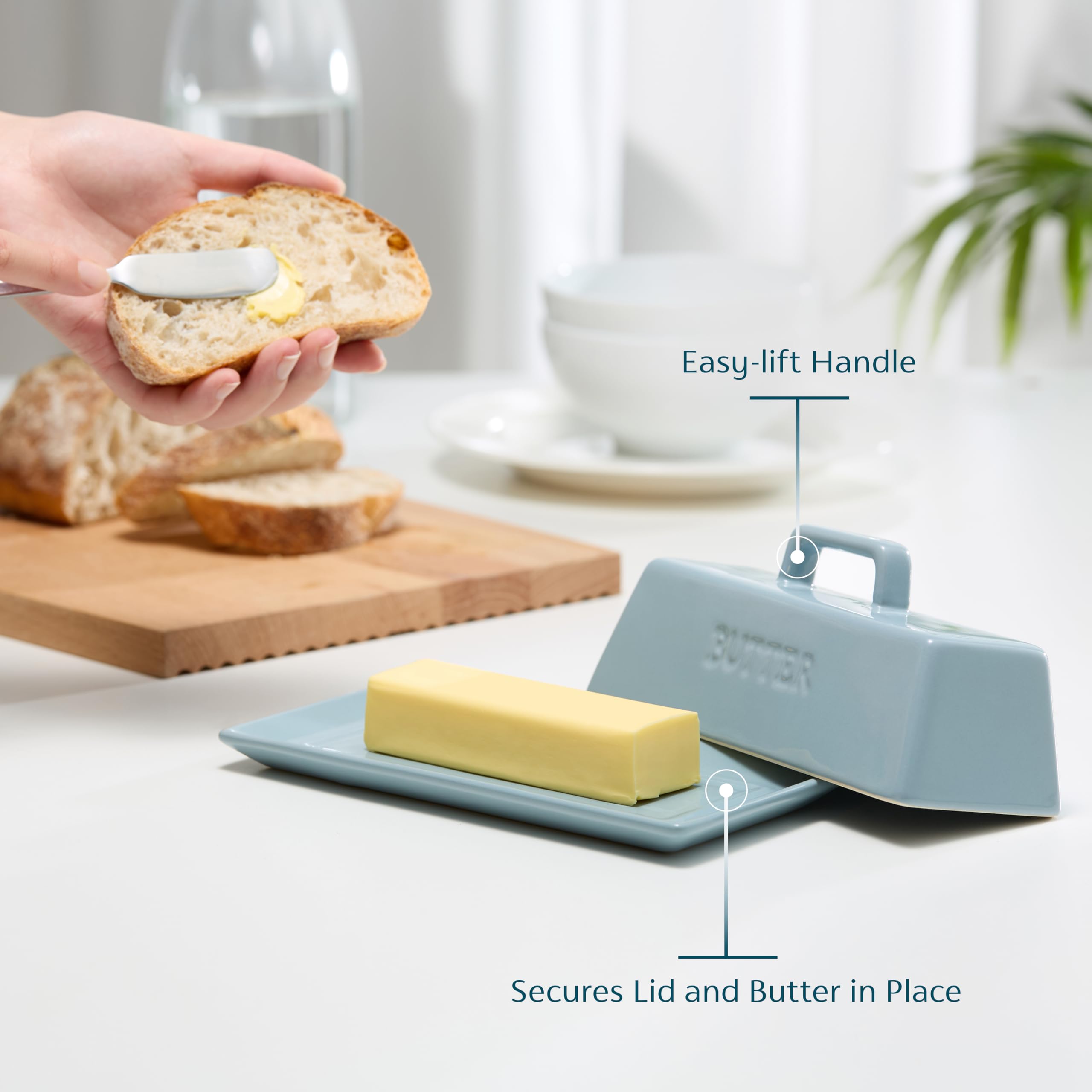 Kook butter dish top-handle lid makes lifting easy while serving warm butter.
