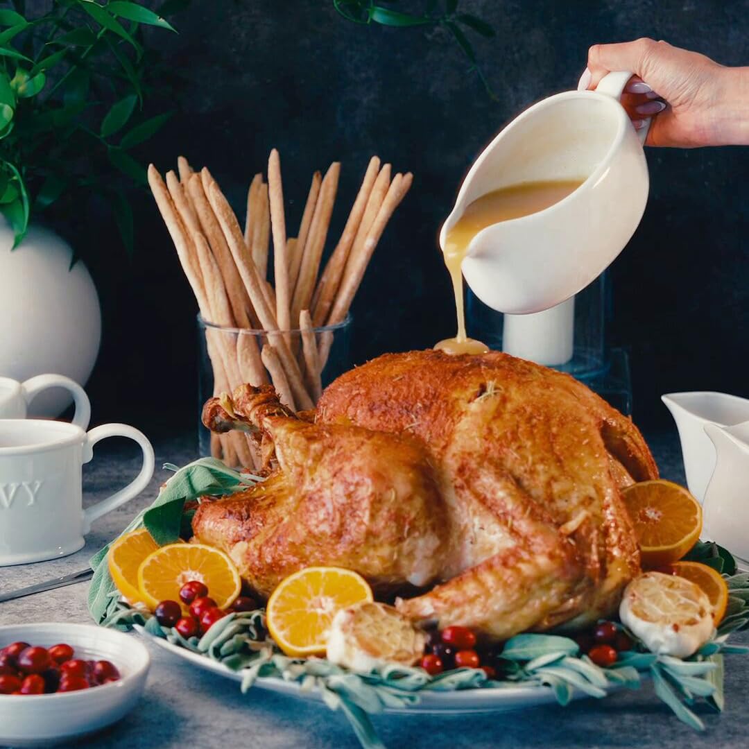 Kook Gravy Boat with matching tray enhances table presentation.