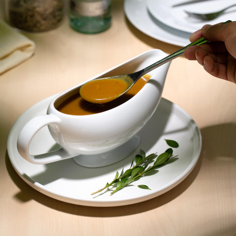 KooK white ceramic dish ideal for gravy and condiments.