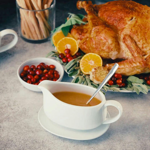 Kook Gravy Boat includes a ladle for easy serving.