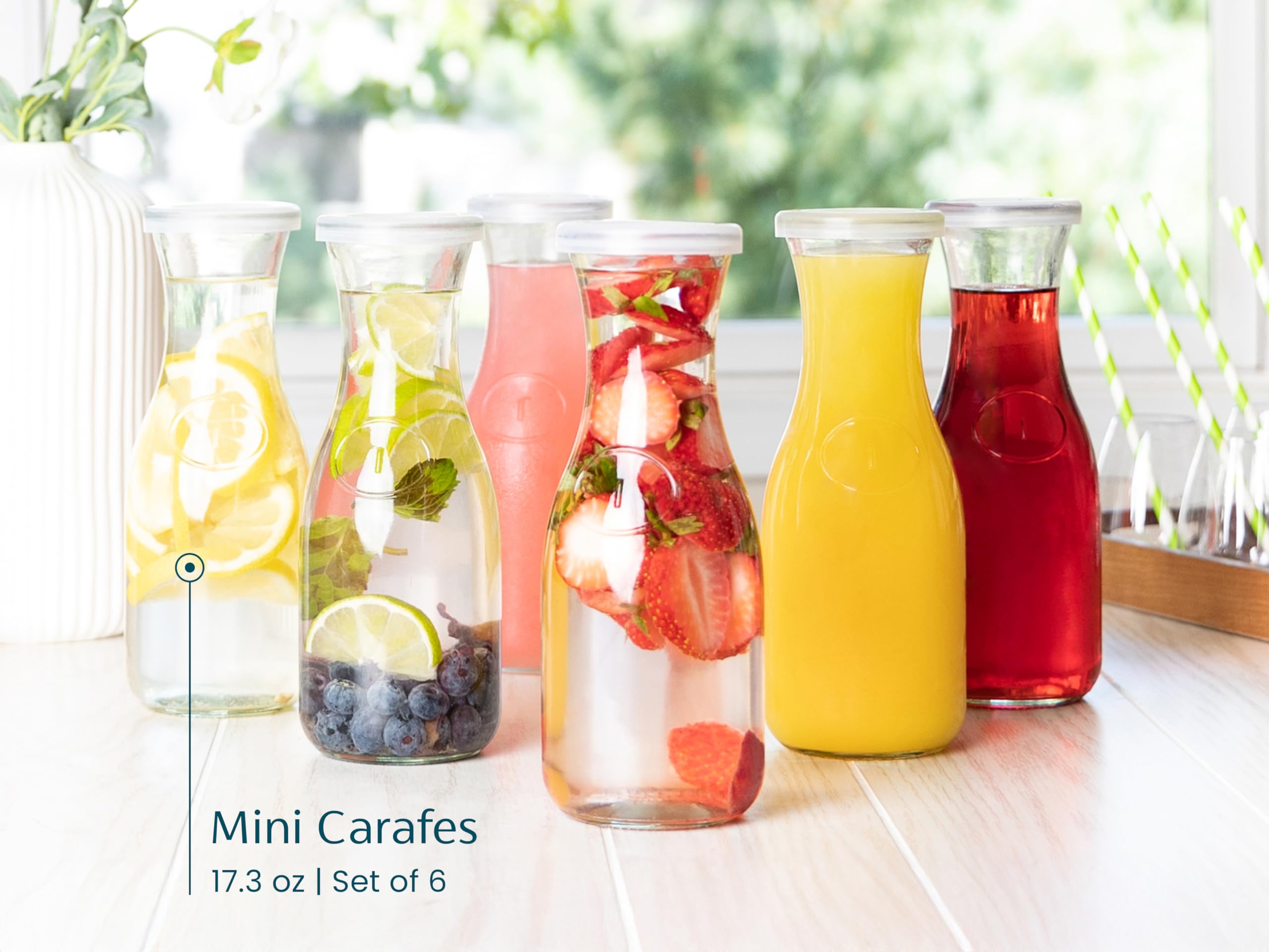 KooK mini carafes on dining table for juices and mimosas.
