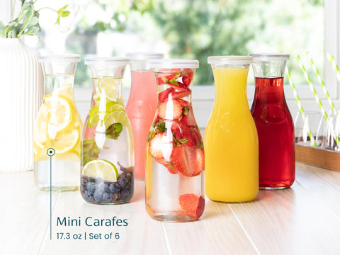 KooK mini carafes on dining table for juices and mimosas.