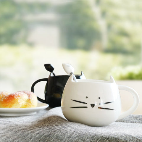 Koolkatkoo cat mug in black and white design for stylish mornings.