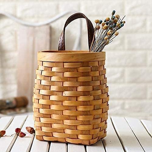 Koolouispoper hanging wicker basket for organizing fruits and decor.