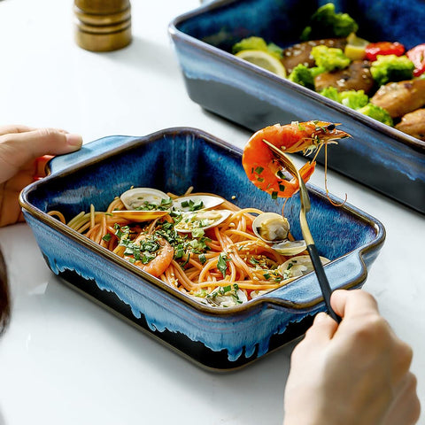 KOOV bakeware on table display enhances dining with colorful Nebula Blue glaze.