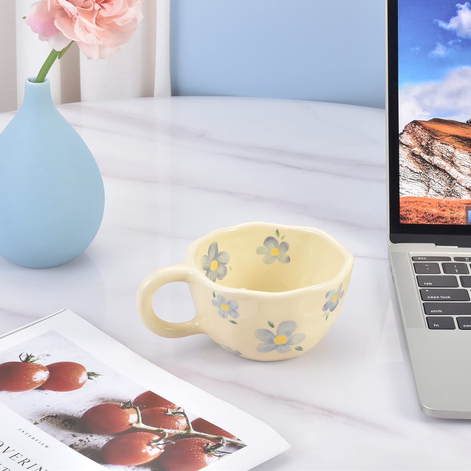 Holding the handcrafted matte finish mug for a stylish desk moment.
