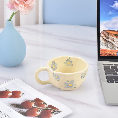 Holding the handcrafted matte finish mug for a stylish desk moment.