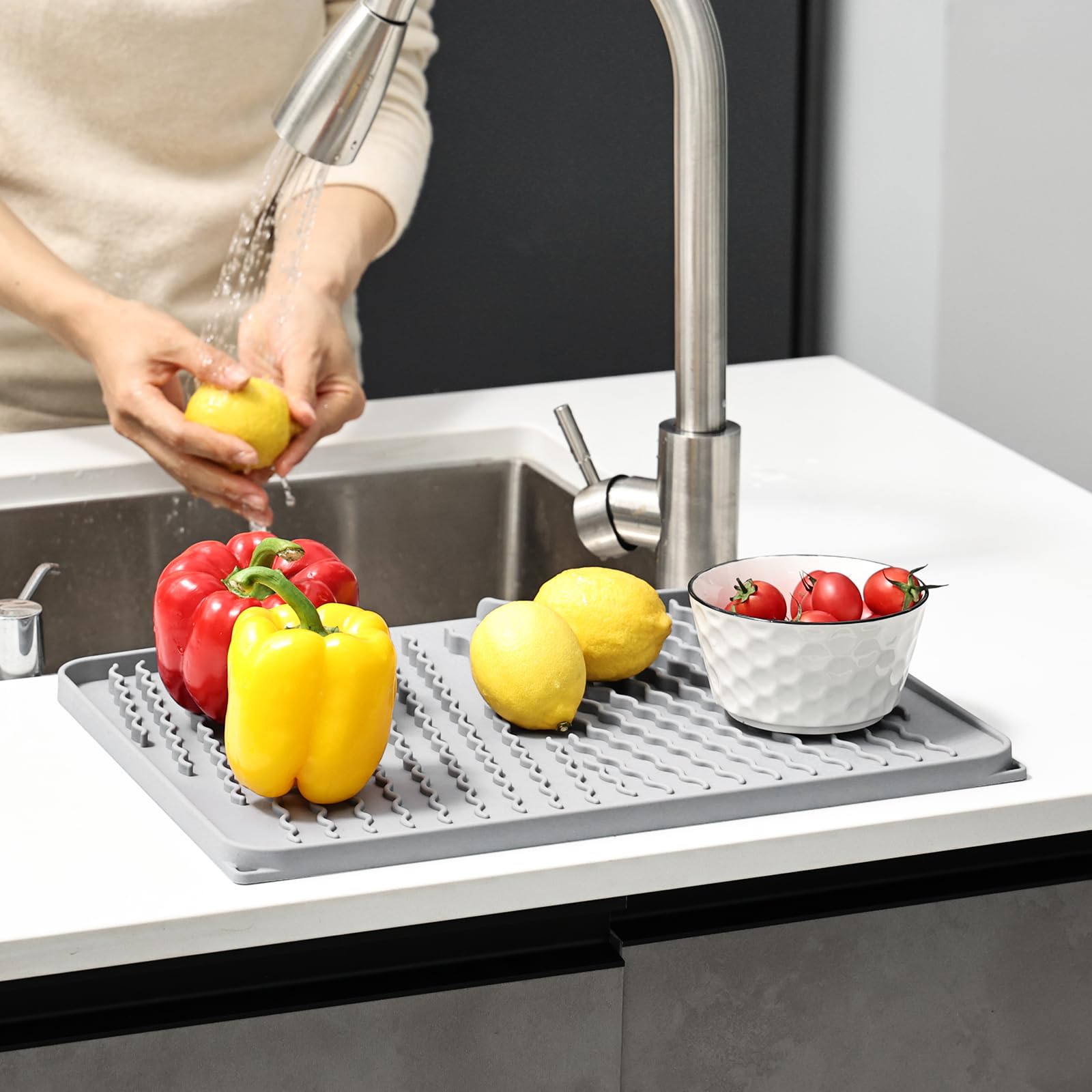 KR KitchenRaku durable silicone mat for drying and organizing household items.