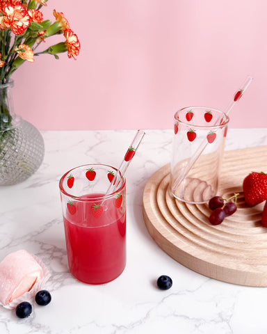 Kreapa strawberry cups with straw for easy, mess-free sipping.