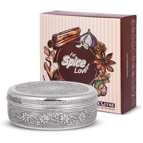 Meenakari decorative spice box enhances festive Christmas decor.
