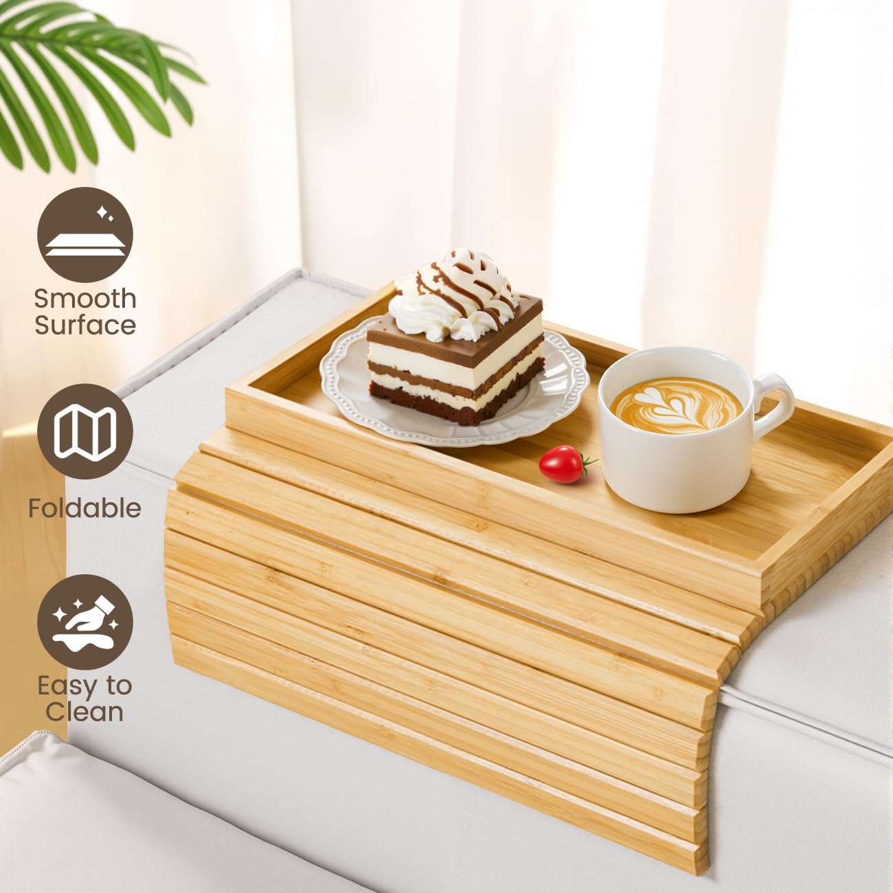 Kssiaz table serves as snack, drink, or device holder.