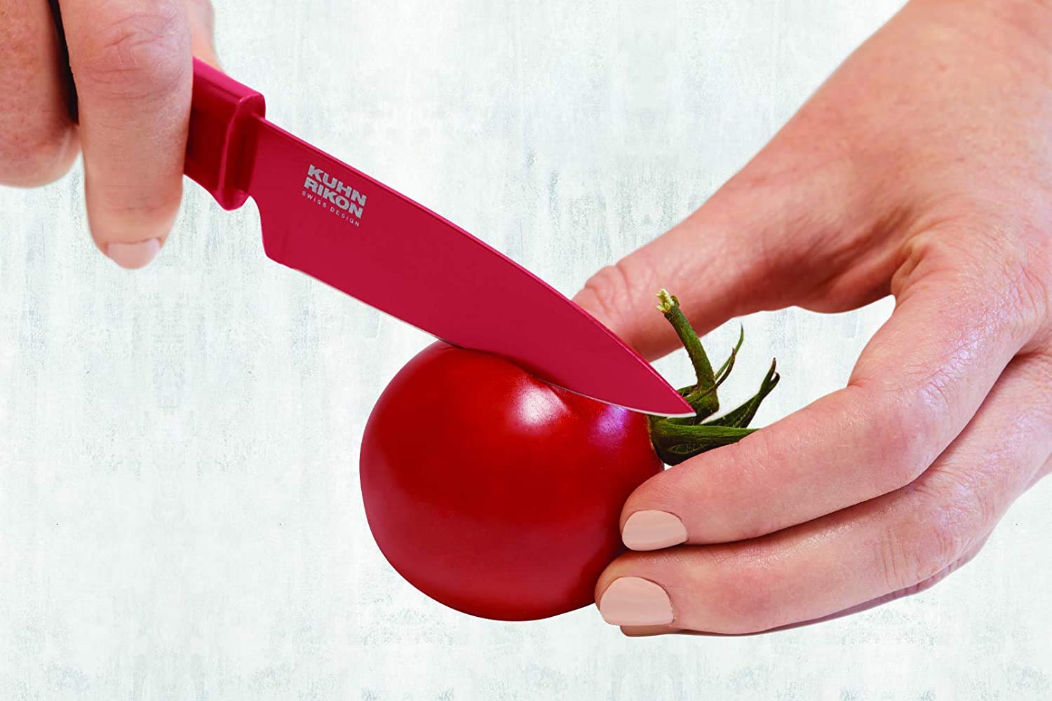 Kuhn Rikon COLORI blade close-up highlights ultra-sharp edge for small cuts