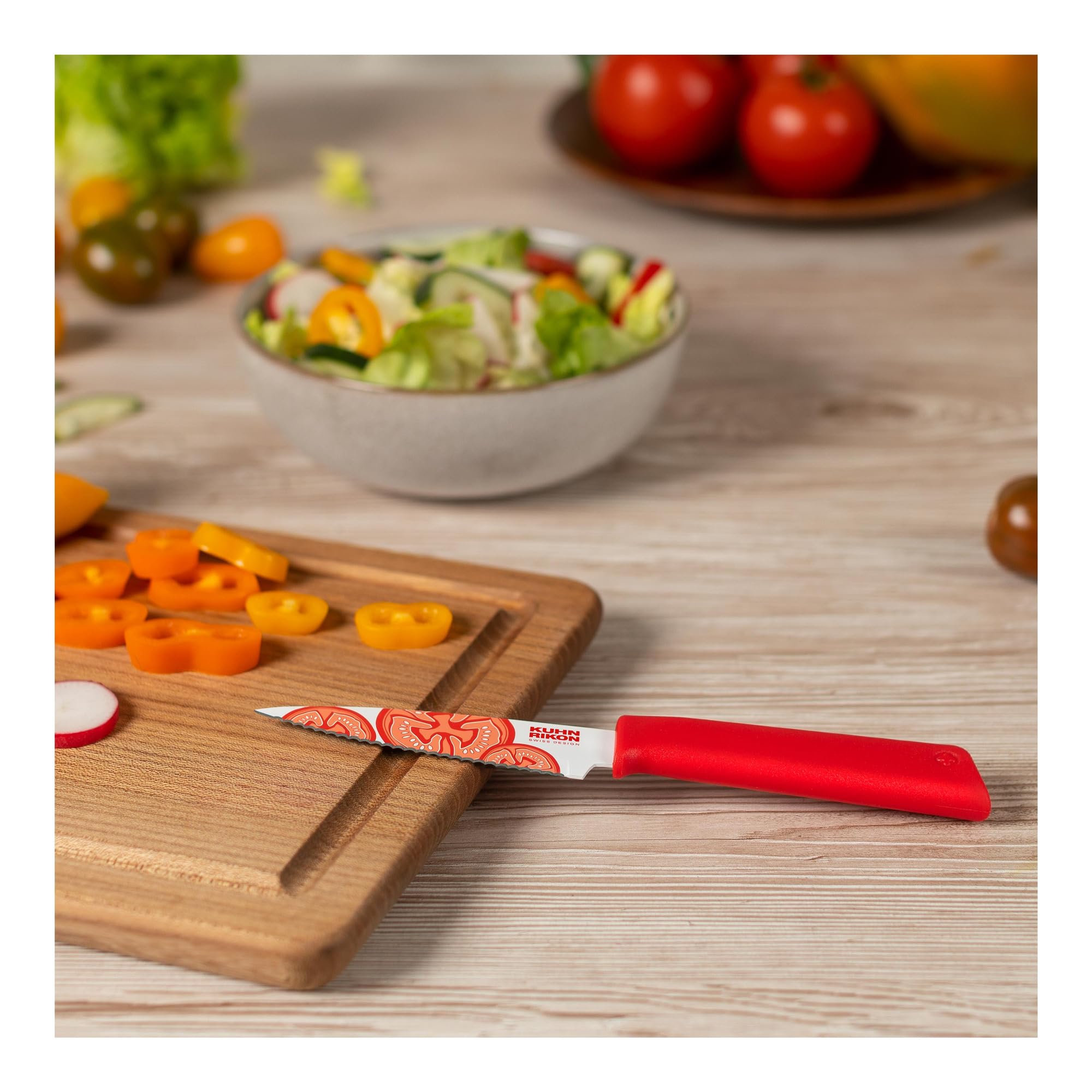 Kuhn Rikon Colori+ Serrated Knife 4-inch non-stick coating aids smooth tomato slicing