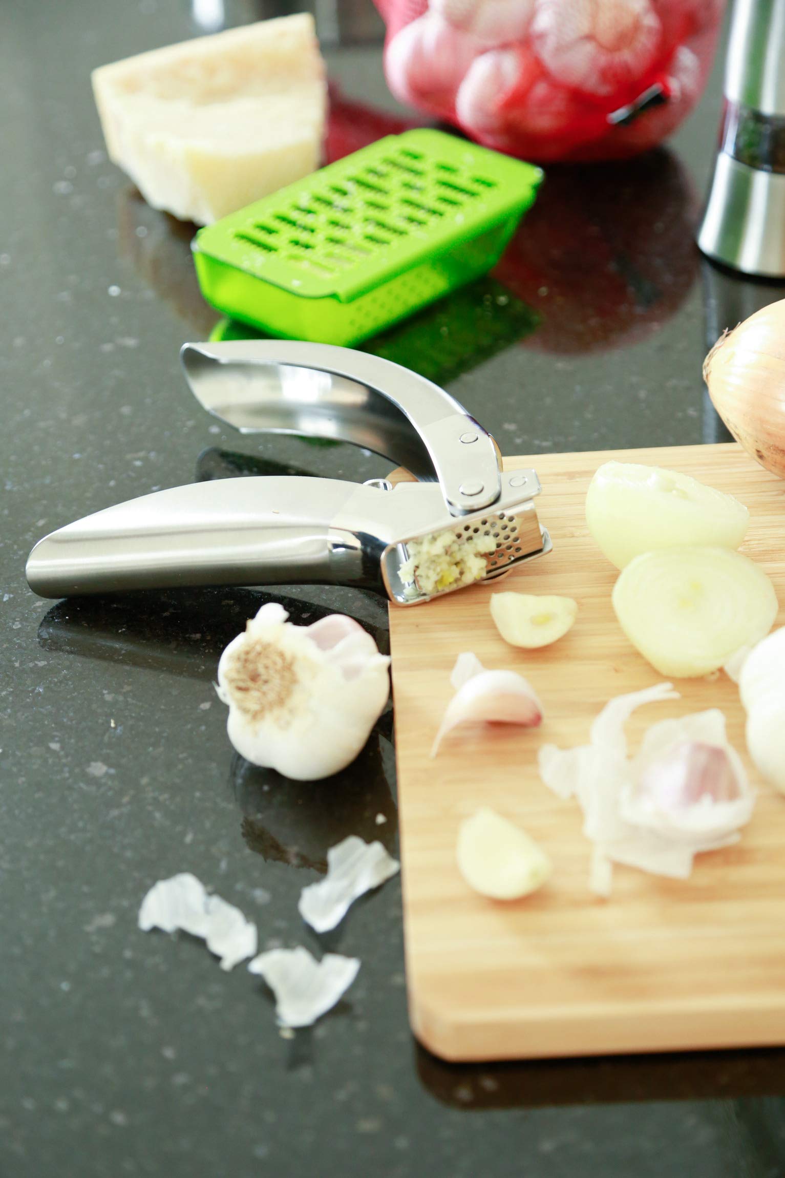 Easy rinse feature on Kuhn Rikon Epicurean garlic press minimizes residue