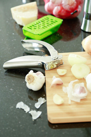 Easy rinse feature on Kuhn Rikon Epicurean garlic press minimizes residue