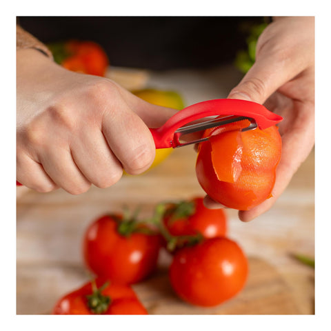In-use view of Piranha peeler producing thin peeled strips