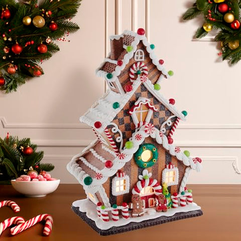 Mantel-ready Kurt S. Adler holiday display with gingerbread house.