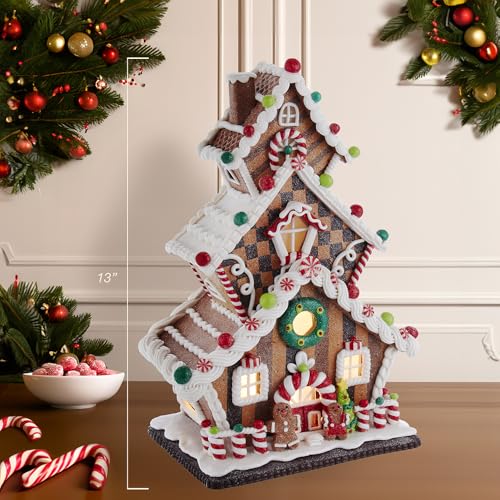 Warm glow from Kurt S. Adler LED gingerbread house enhances ambiance.