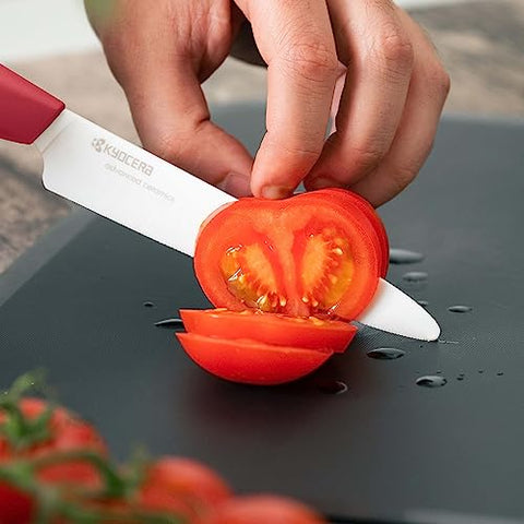 KYOCERA 5-inch tomato knife slices soft skins smoothly for fresh produce.
