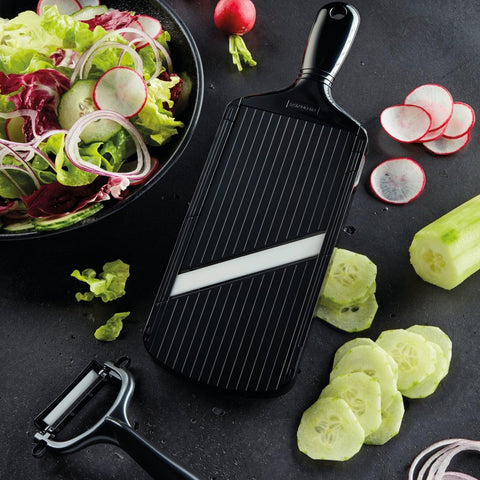 Kyocera mandolin slicer with guard enables safe fruit and vegetable prep