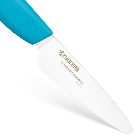 Close-up of Kyocera Revolution 3-inch paring knife edge highlighting razor-sharp precision.