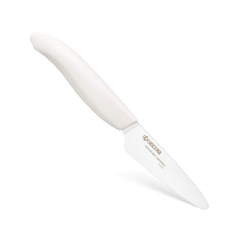 Kyocera Revolution 3in paring knife with white handle for precise peeling.